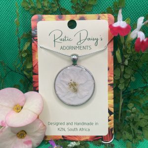 medium-large-silver-coloured-pendant-with-white-background-and-white-flower