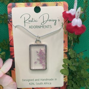 transparent-medium-rectangular-silver-coloured-pendant-with-pink-coloured-wild-flowers