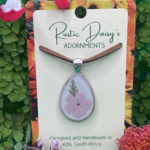 medium-drop-shaped-silver-coloured-pendant-with-white-background-and-pink-flower-with-leaf