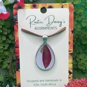medium-silver-coloured-drop-shape-pendant-with-red-poinsettia-petal-and-fern-leaf