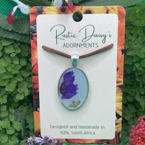 medium-oval-shaped-silver-coloured-background-with-purple-flower-and-fern-leaves