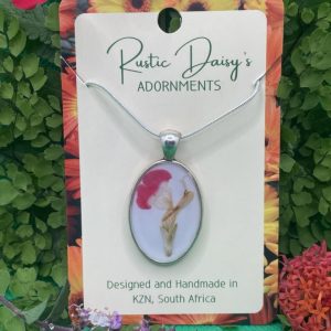 medium-oval-silver-coloured-pendant-with-white-background-and-hot-lips-salvia-flower